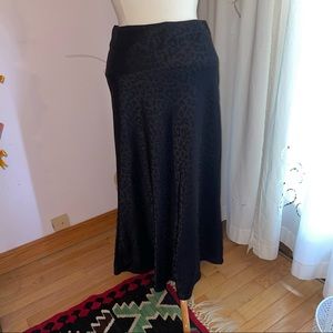 *3 For $30* Black leopard print satin type  skirt size 8
